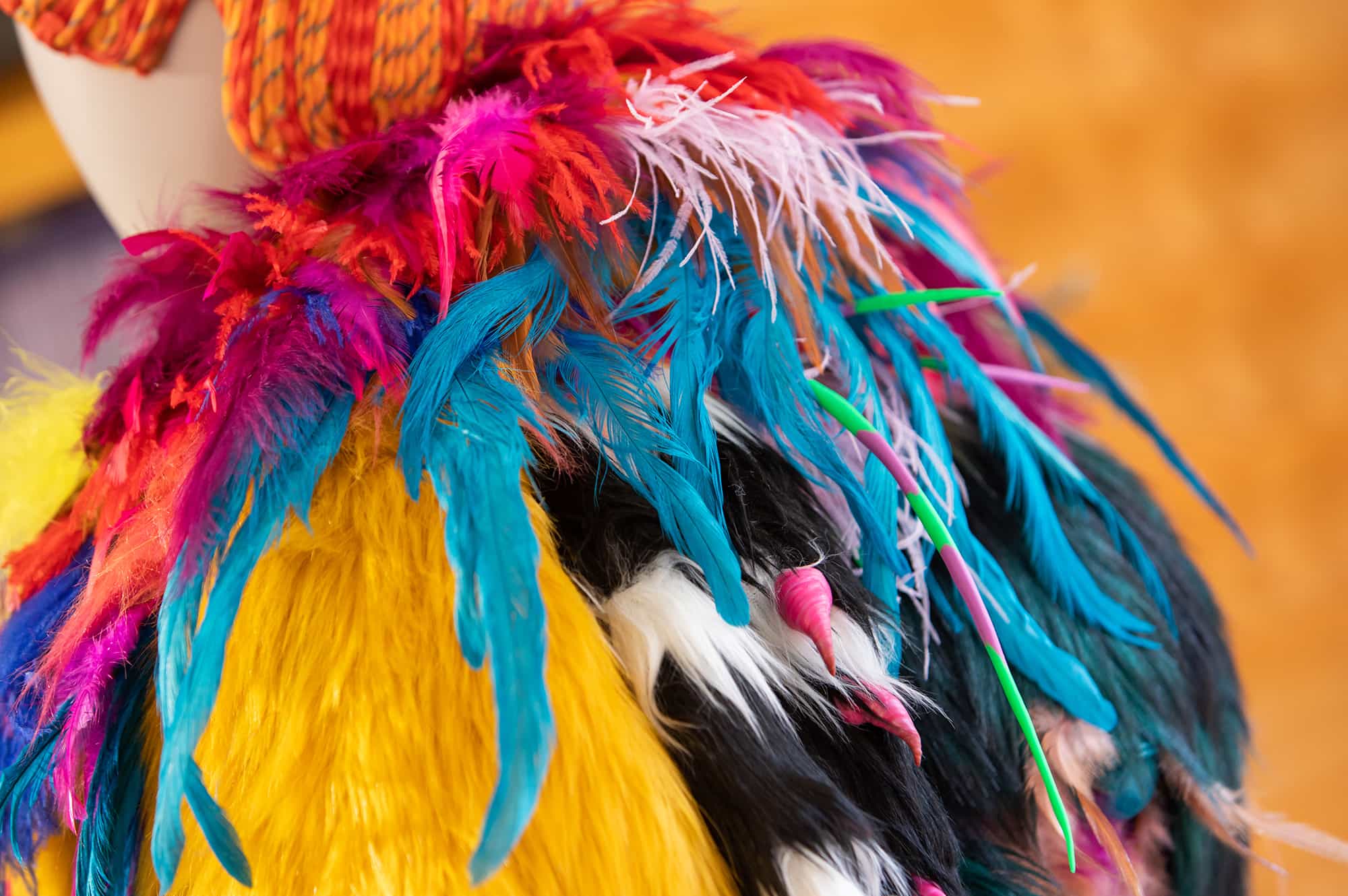Close up of a costume with feathers and fur by Stephanie Shaw, show at Oxo Tower | Photographer: David Poultney