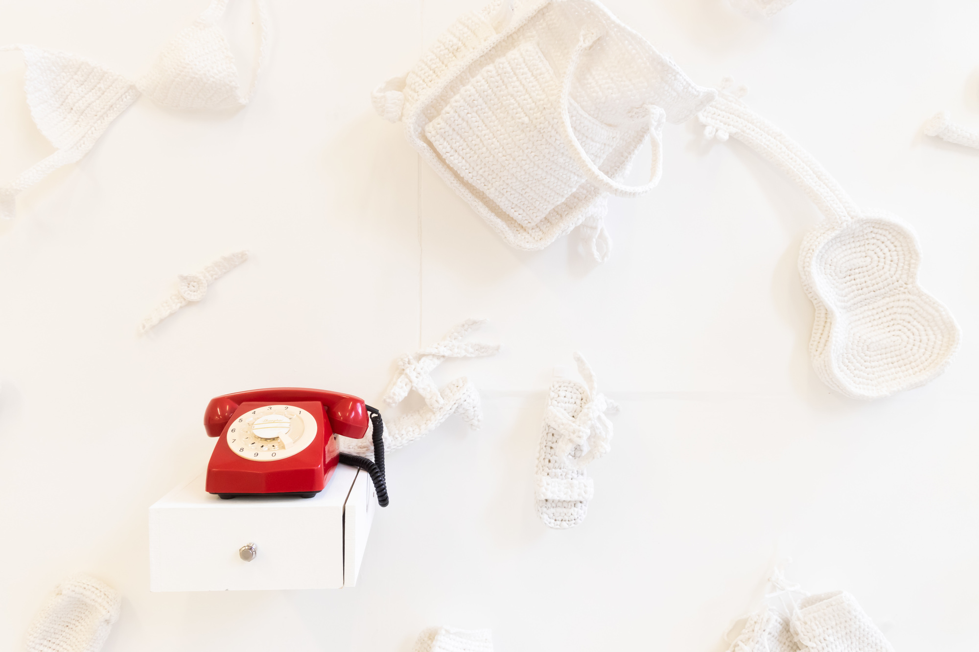 Knitted accessories and telephone installation | Xinyi Zhang